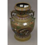 A late 19th century Chinese champleve enamel decorated bronze vase. 30 cm high.