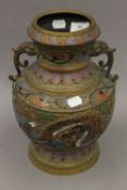 A late 19th century Chinese champleve enamel decorated bronze vase. 30 cm high.