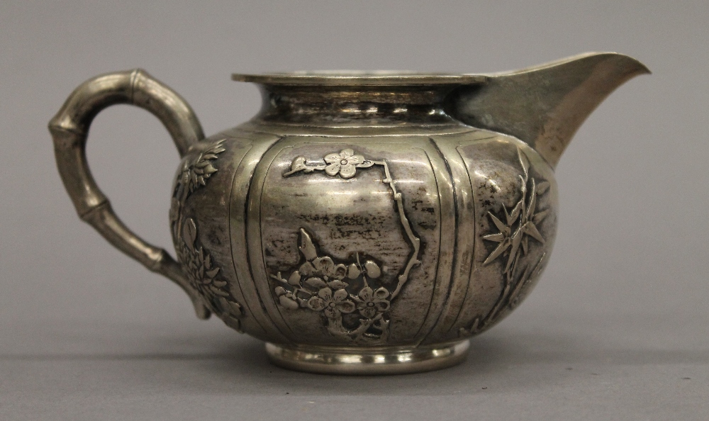 A Chinese silver three-piece tea set. The teapot 25 cm long. 30.1 troy ounces. - Image 10 of 18