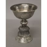 A Tibetan unmarked silver stem cup. 15 cm high.