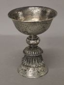 A Tibetan unmarked silver stem cup. 15 cm high.