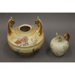 A Royal Worcester blush ivory twin handled vase number 1256 and a jug number 1094.