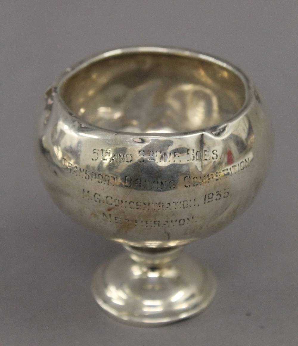 A small silver trophy, with inscription for ''Transport Driving Competition M.G.