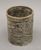 A Chinese white metal brush pot. 12.5 cm high.