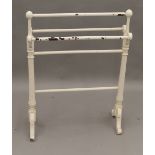 A Victorian white painted towel rail. 69 cm long.