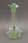 A vaseline glass epergne. 36 cm high.