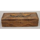 A late 19th/early 20th century carved pine box. 27 cm long.