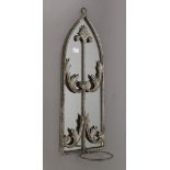 A single pot garden mirror. 56 cm high.