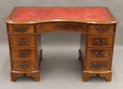 A mahogany pedestal desk. 122 cm wide.