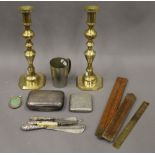 A quantity of various metalware, including silver button hook and shoe lasts, and three rules, etc.