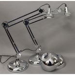 A pair of chrome anglepoise lamps. 75 cm high.