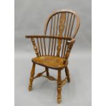 A modern child's Windsor chair. 71 cm high.