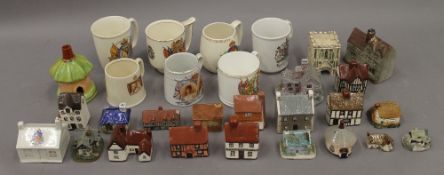 A small collection of Coronation mugs, cottages, etc.