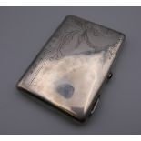 A Russian silver cigarette case. 11.5 cm high.