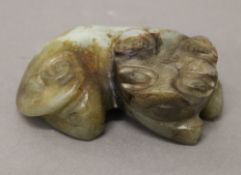 A russet jade dog-of-fo. 9.5 cm long.