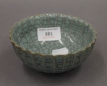 A Chinese crackle glaze bowl with incised mark to base. 12.5 cm diameter.
