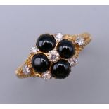 A 9 ct gold Victorian style onyx and diamond ring. Ring size O. 2.8 grammes total weight.