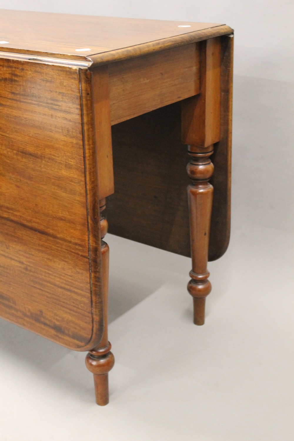 A Victorian mahogany drop leaf table. 106 cm wide. - Image 3 of 4