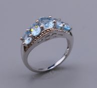 A silver dress ring. Ring size O/P.