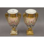 A pair of 19th century Continental porcelain vases. 25 cm high.