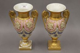 A pair of 19th century Continental porcelain vases. 25 cm high.