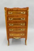 A 19th century style inlaid chest of drawers. 39 cm wide.