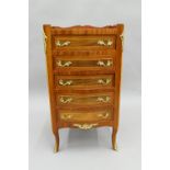 A 19th century style inlaid chest of drawers. 39 cm wide.