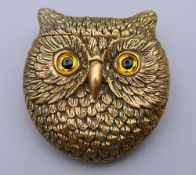 A brass owl form vesta. 4.5 cm wide.