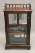 A Victorian music cabinet. 58 cm wide.