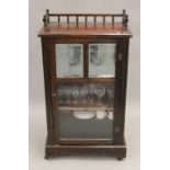 A Victorian music cabinet. 58 cm wide.