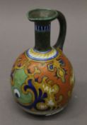 A Gouda ewer, underside marked 1017B Hobian Gouda Holland. 19.5 cm high.