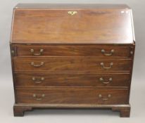 A George III mahogany bureau. 115 cm wide.