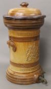 A Doulton & Watts large salt glazed water filter, circa 1860, with lid and brass tap. 48 cm high.