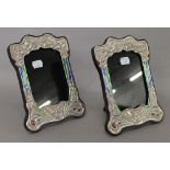 A pair of Art Nouveau style silver photograph frames. 16 x 21 cm.