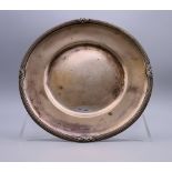 A silver dish, bearing Russian marks. 16.5 cm diameter. 5.2 troy ounces.