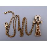 An Egyptian Ankh pendant on chain. The pendant 3.5 cm high.