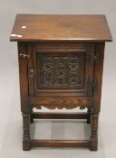 A modern 18th century style oak side cabinet. 48 cm wide.