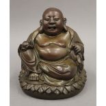 A seated bronze model of Buddha. 16 cm high.