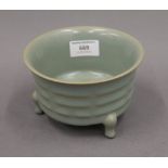 A Chinese crackle glaze blue censer. 14 cm diameter.