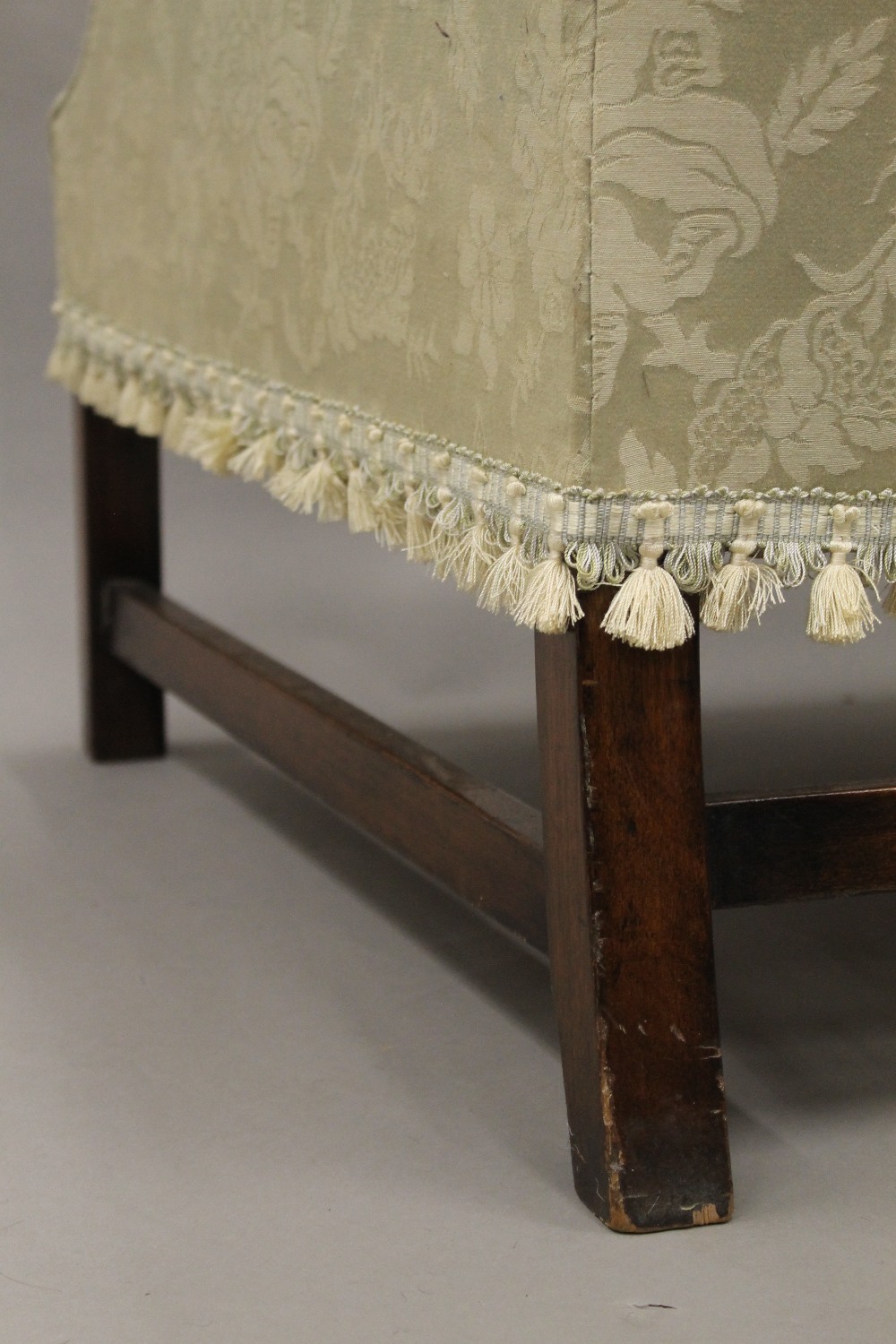 An early 20th century upholstered wing back armchair. 80 cm wide. - Image 5 of 8