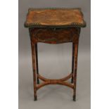 An 18th/19th century French ormolu mounted side table. 43 cm wide.