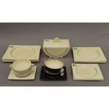 A Clarice Cliff ''The Biarritz'' dinner service, comprising: 5 white bowls, 5 white stands,