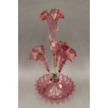 A cranberry glass epergne. 48 cm high.