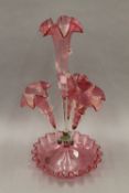 A cranberry glass epergne. 48 cm high.