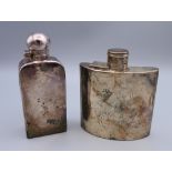A silver hip flask (4.6 troy ounces) and a plated hip flask. The former 10 cm high.