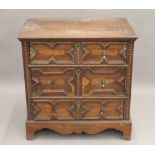 An 18th century and later oak geometrically moulded chest of drawers. 87 cm wide.