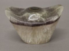 A mineral paperweight. 10 cm wide.