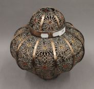 A Moroccan style light shade. 31 cm high.