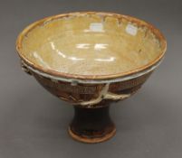 A Studio Pottery pedestal bowl. 19 cm high.