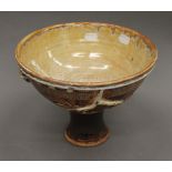 A Studio Pottery pedestal bowl. 19 cm high.